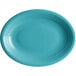 An oval Caribbean turquoise stoneware platter with a rim.