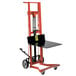 A red and black Wesco Industrial Products hydraulic hand truck with 4 wheels.