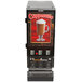 A Bunn hot beverage dispenser with a glass of coffee on top.