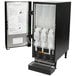 A black Bunn hot beverage dispenser with three plastic hoppers inside.