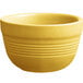 a yellow bowl with a white background