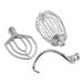 The silver Waring Luna planetary stand mixer with a whisk attachment.