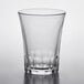 A clear Duralex glass tumbler on a table.