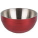 A red and silver stainless steel Vollrath beehive serving bowl with a handle.