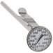 A close-up of a Comark pocket probe dial thermometer with a white handle and silver metal.