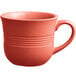 An Acopa Capri stoneware cup in coral reef with a handle.