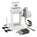 A white Backyard Pro meat tenderizer machine with a metal handle and parts on it.