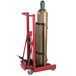 A Wesco Industrial Products hydraulic cylinder cart with wheels and a platform holding a metal cylinder.