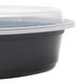 a black container with a clear lid
