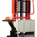 A Wesco Industrial Products power drive fork stacker with a black handle and orange wheels.