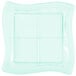 A clear plastic square tray with a square grid design.