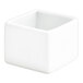A small white square porcelain ramekin.