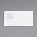 A rectangular white porcelain plate with a built-in square well.