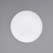 A white Front of the House porcelain plate.