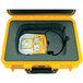 A yellow plastic case for Defibtech AEDs.