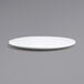 A white Front of the House porcelain plate with a small rim.