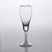 An Anchor Hocking tulip champagne flute on a white surface.