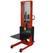 A red and black Wesco Industrial Products power lift platform stacker.