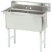 A stainless steel Advance Tabco two compartment sink with two bowls.