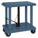 a blue cart with a black handle