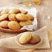 A plate of muffins on a table.