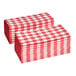 A stack of red and white gingham-patterned 2-ply dinner napkins.