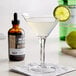 a lime wedge with a spoon