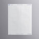 A white paper with rectangles containing blue writing.
