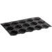 A black Sasa Demarle Flexipan silicone bread mold with 15 round cavities.