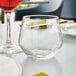 An Arcoroc customizable rocks glass on a table.