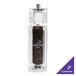 A glass container with a Chef Specialties Gem Pepper Mill on top filled with black peppercorns.