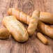 A group of Rich's French bread loaves on a table.