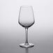 An Arcoroc customizable wine glass on a table.