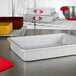A Fat Daddio's rectangular cake pan on a counter.