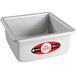 A square silver Fat Daddio's anodized aluminum cake pan.