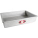 A silver rectangular baking pan with a red and white label.