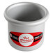 A silver round cake pan with a red and white Fat Daddio's label.