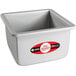 A white square metal Fat Daddio's cake pan with a red and white label.