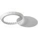 A white round metal Fat Daddio's fluted tart and quiche pan with a removable bottom.