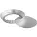 A silver round fluted tart pan with a removable bottom.