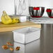 A silver rectangular Fat Daddio's bread loaf pan on a counter.