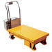 A Wesco yellow powered scissors lift table with a silver handle.