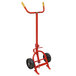 a red hand pump with a handle