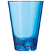 a blue glass with a white background