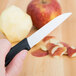 a close-up of a hand holding a knife
