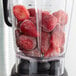 IQF Whole Strawberries in a blender.