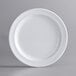 A white Acopa Foundations melamine plate with a narrow white rim.