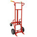 A red Wesco Industrial Products steel drum hand truck with black and red wheels.