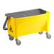 A yellow and grey Lavex Microfiber Mop Bucket with wheels.