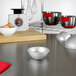 A Fat Daddio's hemisphere cake pan on a kitchen counter.